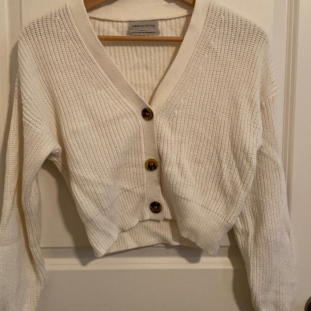 Urban Outfitters cream sweater.